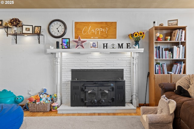 1910 Lincoln St, North Bend, OR 97459 - living area featuring wood finished floors, crown molding, and a fireplace