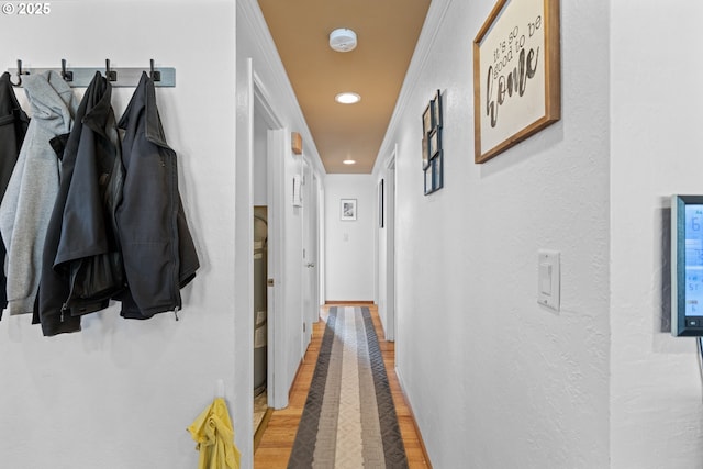 1910 Lincoln St, North Bend, OR 97459 - hall with recessed lighting, light wood-style floors, a textured wall, and ornamental molding