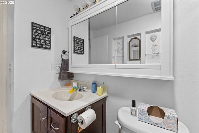1910 Lincoln St, North Bend, OR 97459 - bathroom with toilet and vanity