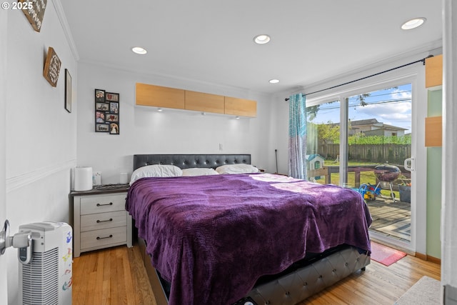 1910 Lincoln St, North Bend, OR 97459 - bedroom with access to exterior, recessed lighting, light wood finished floors, and crown molding