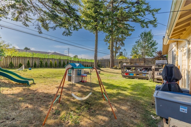 1910 Lincoln St, North Bend, OR 97459 - view of play area featuring a fenced backyard