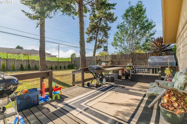 1910 Lincoln St, North Bend, OR 97459 - wooden deck with a fenced backyard and area for grilling