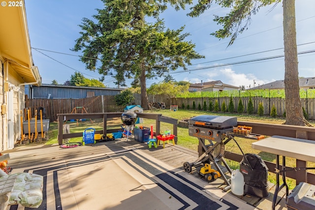 1910 Lincoln St, North Bend, OR 97459 - wooden terrace with a fenced backyard