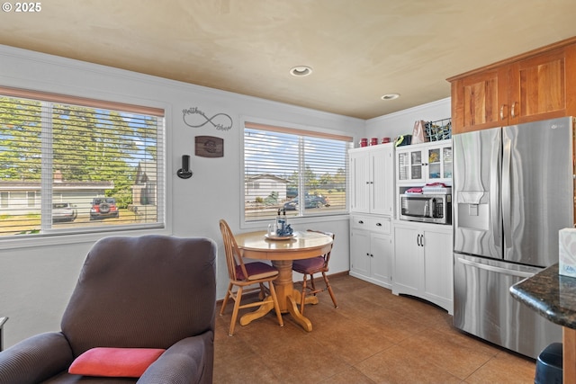 1910 Lincoln St, North Bend, OR 97459 - dining area featuring recessed lighting, crown molding, and light tile patterned floors