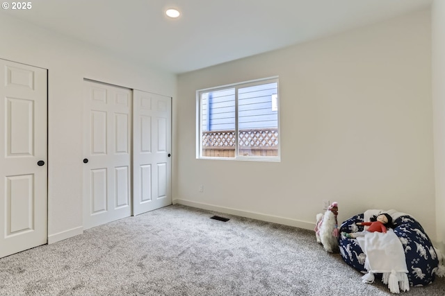 unfurnished bedroom featuring carpet