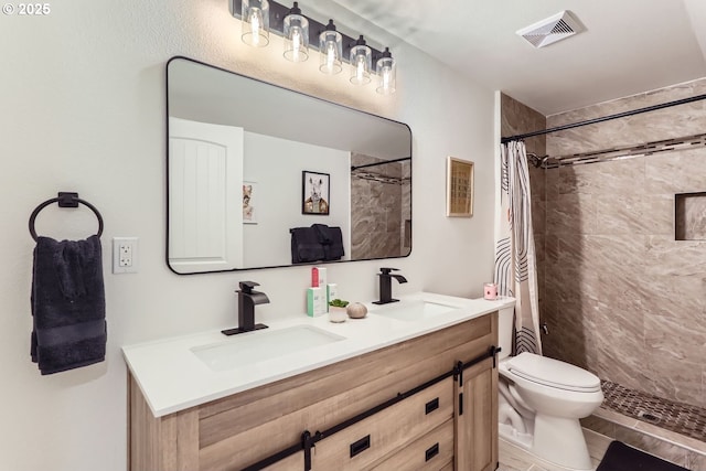 bathroom with toilet, walk in shower, and vanity