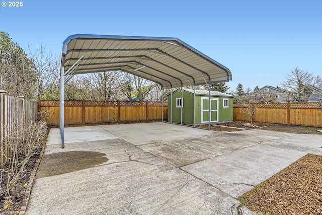 view of patio with a shed and a carport