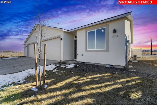 1203 NE Emerald Dr, Hermiston, OR 97838 - single story home with a garage, driveway, stucco siding, and crawl space