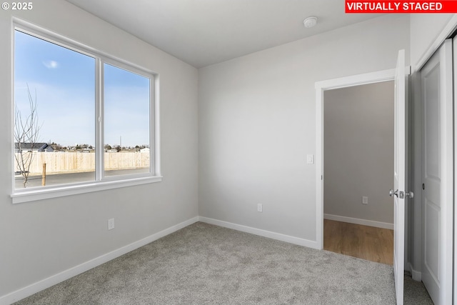 1203 NE Emerald Dr, Hermiston, OR 97838 - carpeted empty room with healthy amount of natural light and a smoke detector