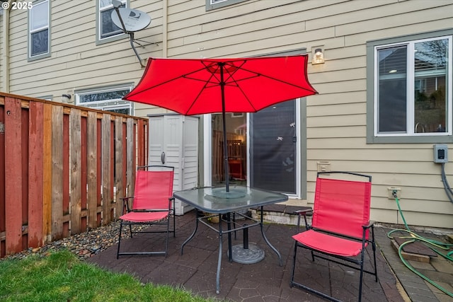 view of patio with fence