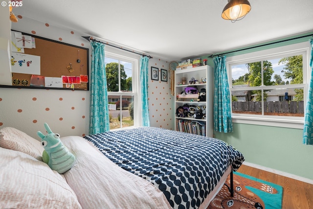 4315 SE Rhodesa St, Milwaukie, OR 97222 - bedroom featuring wood finished floors and baseboards