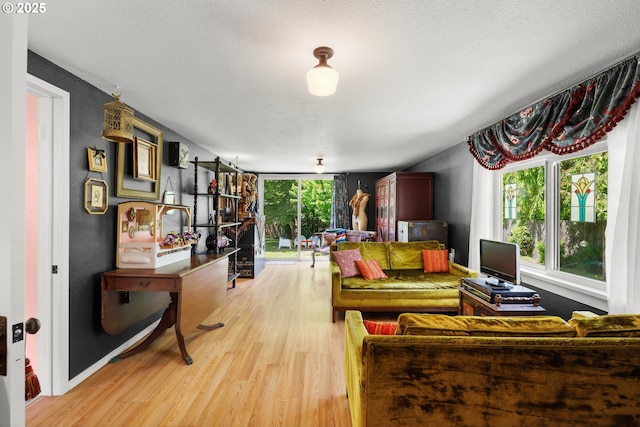 4315 SE Rhodesa St, Milwaukie, OR 97222 - living room with light wood finished floors and a textured ceiling