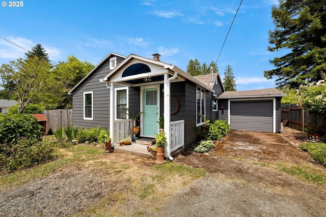 4315 SE Rhodesa St, Milwaukie, OR 97222 - view of front of property with driveway, a chimney, and a garage
