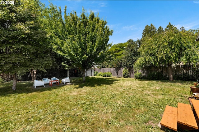 4315 SE Rhodesa St, Milwaukie, OR 97222 - fenced backyard with a storage unit