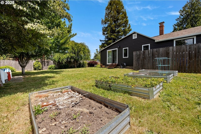 4315 SE Rhodesa St, Milwaukie, OR 97222 - view of yard featuring a garden and entry steps