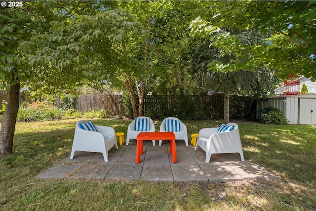 4315 SE Rhodesa St, Milwaukie, OR 97222 - fenced backyard with a storage shed and a patio area