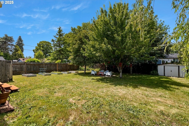 4315 SE Rhodesa St, Milwaukie, OR 97222 - fenced backyard featuring a storage unit