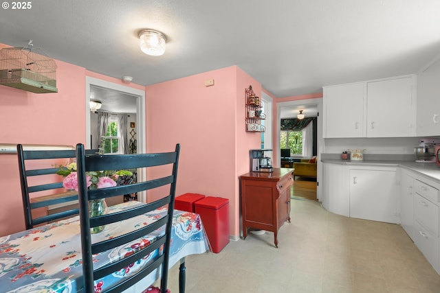 4315 SE Rhodesa St, Milwaukie, OR 97222 - kitchen with white cabinetry, light countertops, and light flooring