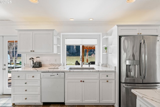 9202 Phey Ln, Florence, OR 97439 - kitchen featuring white cabinets, open shelves, a sink, dishwasher, and stainless steel refrigerator with ice dispenser