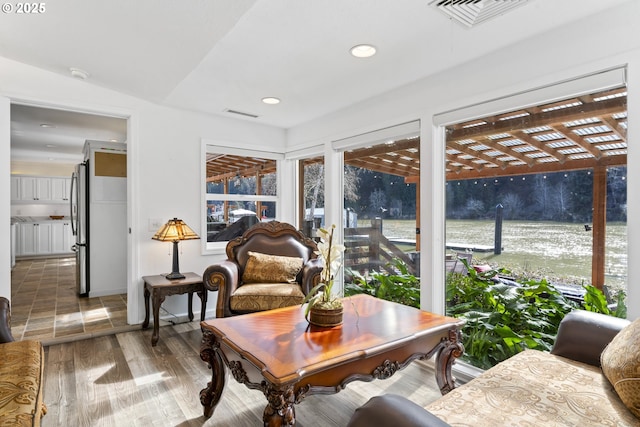 9202 Phey Ln, Florence, OR 97439 - sunroom / solarium with visible vents, recessed lighting, and wood finished floors