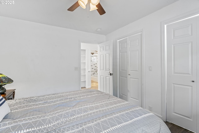 9202 Phey Ln, Florence, OR 97439 - bedroom with a closet, ceiling fan, and wood finished floors