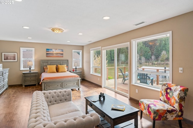 9202 Phey Ln, Florence, OR 97439 - bedroom with baseboards, access to outside, recessed lighting, and visible vents
