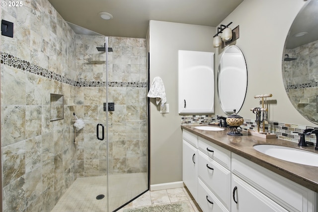13720 SW Butner Rd, Beaverton, OR 97005 - full bath featuring double vanity, a stall shower, tasteful backsplash, and baseboards