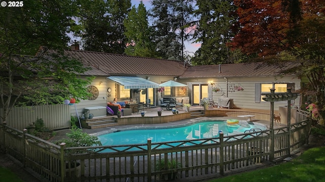 13720 SW Butner Rd, Beaverton, OR 97005 - view of swimming pool with a wooden deck, a diving board, and a patio