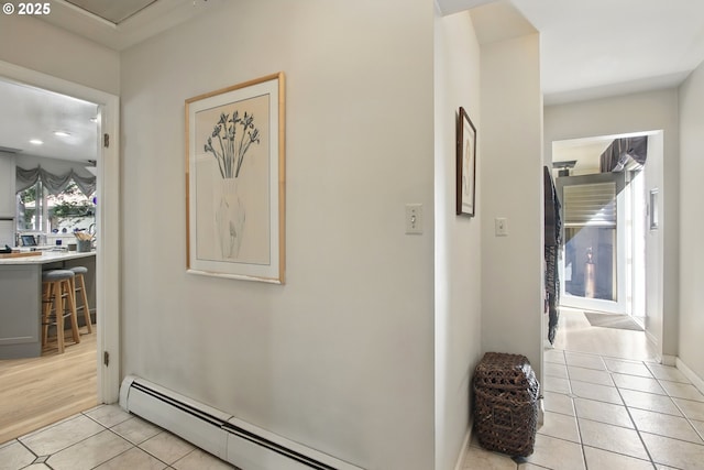 13720 SW Butner Rd, Beaverton, OR 97005 - hall featuring light tile patterned floors, a baseboard radiator, and baseboards