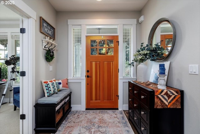 foyer entrance with baseboards