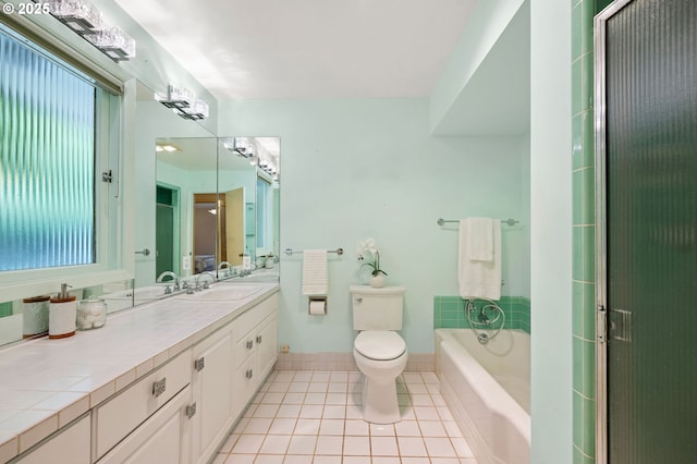 1228 11th St, Astoria, OR 97103 - full bathroom with tile patterned floors, vanity, and a garden tub