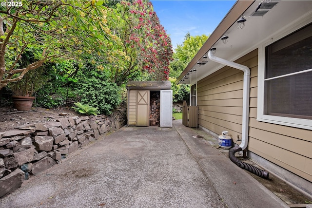 1228 11th St, Astoria, OR 97103 - view of patio with a shed