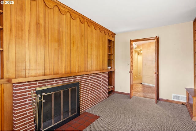 1228 11th St, Astoria, OR 97103 - unfurnished living room with carpet floors and a fireplace