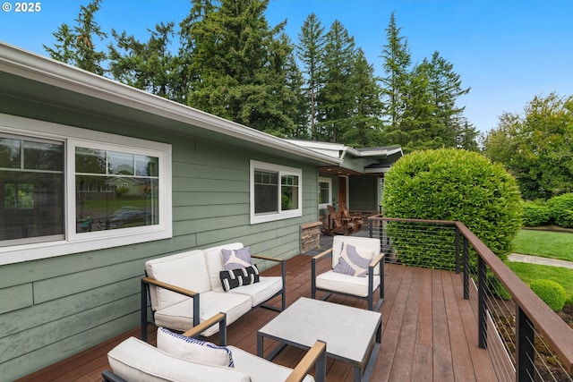 wooden terrace with an outdoor hangout area
