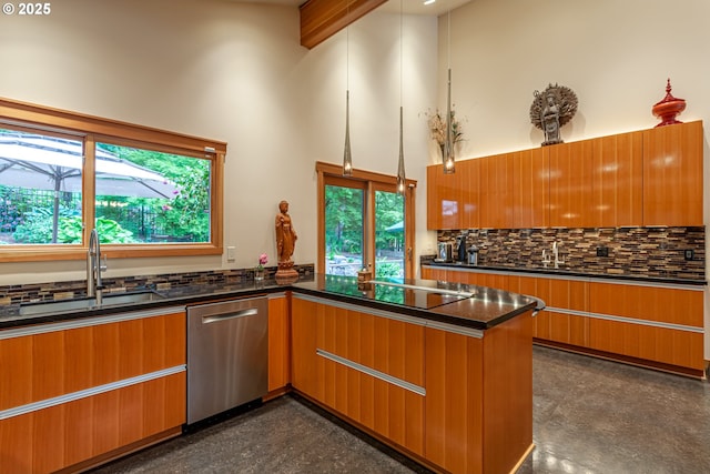 11 Da Vinci St, Lake Oswego, OR 97035 - kitchen with stainless steel dishwasher, black electric cooktop, tasteful backsplash, a sink, and high vaulted ceiling