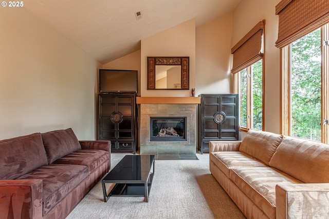 11 Da Vinci St, Lake Oswego, OR 97035 - carpeted living room with a tile fireplace and vaulted ceiling