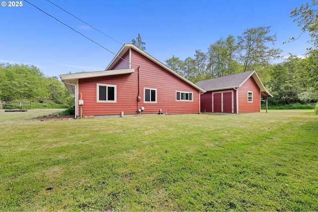 290 12th Ave, Hammond, OR 97121 - rear view of house with a lawn
