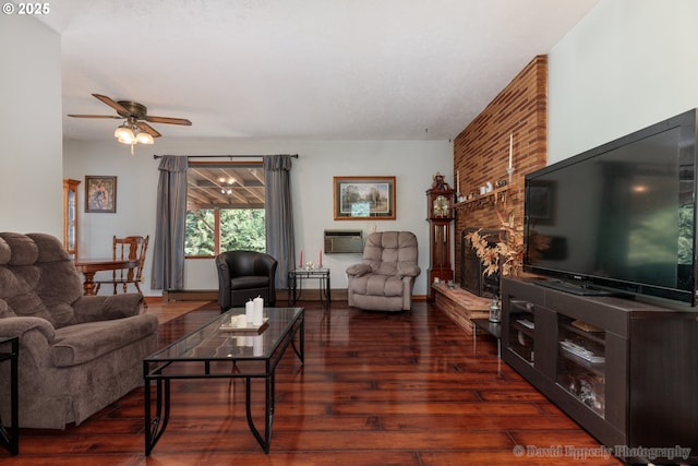 34546 Moore Rd, Scappoose, OR 97056 - living room featuring ceiling fan, an AC wall unit, a fireplace, and dark wood-style flooring
