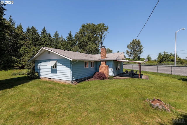 34546 Moore Rd, Scappoose, OR 97056 - rear view of property with a chimney, crawl space, and a patio