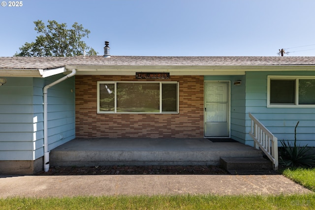 34546 Moore Rd, Scappoose, OR 97056 - view of front of home featuring a porch and brick siding