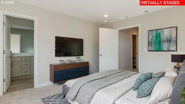 17197 SE Maple Hill Ln, Happy Valley, OR 97086 - bedroom featuring light colored carpet, connected bathroom, and recessed lighting