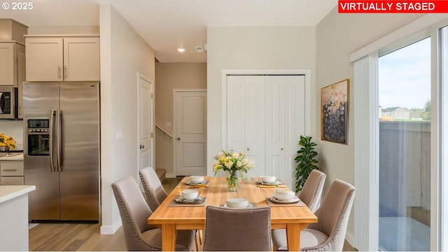 17197 SE Maple Hill Ln, Happy Valley, OR 97086 - dining room featuring light wood finished floors