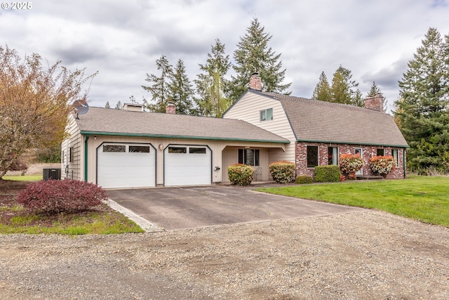 22651 S Penman Rd, Oregon City, OR 97045 - view of front facade with aphalt driveway, a chimney, a garage, central AC, and a front lawn