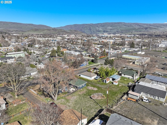 drone / aerial view with a residential view and a mountain view