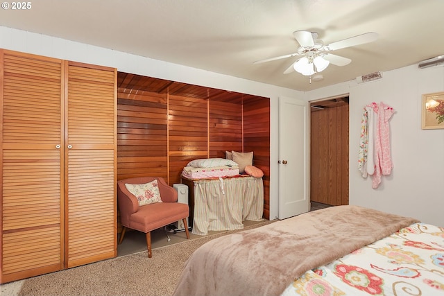 bedroom with carpet and a ceiling fan