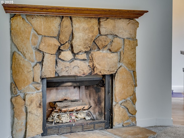 interior details featuring a wood stove