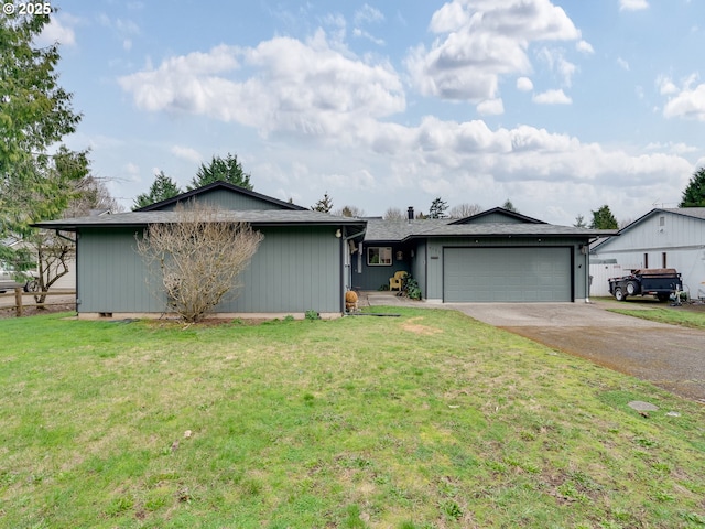 ranch-style house with concrete driveway, a garage, and a front lawn