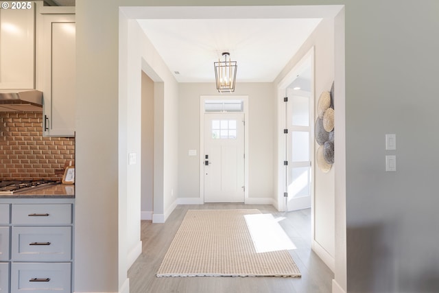 1718 SE 40th St, Brush Prairie, WA 98606 - entrance foyer featuring light wood-style flooring and baseboards