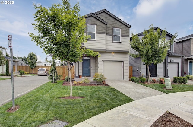view of front of property featuring driveway and an attached garage