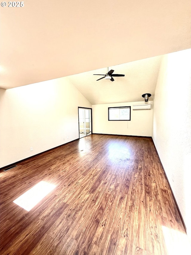 2011/2013 Ohio Ave, North Bend, OR 97459 - spare room featuring ceiling fan, lofted ceiling, wood finished floors, and a wall unit AC